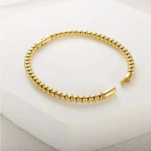Bracelet bille jonc doré ouvert