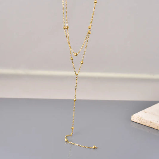 Collier Y acier inoxydable dore longueur ajustable femme