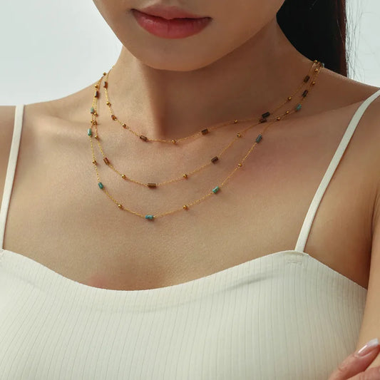 Collier layering acier inoxydable doré pierres naturelles