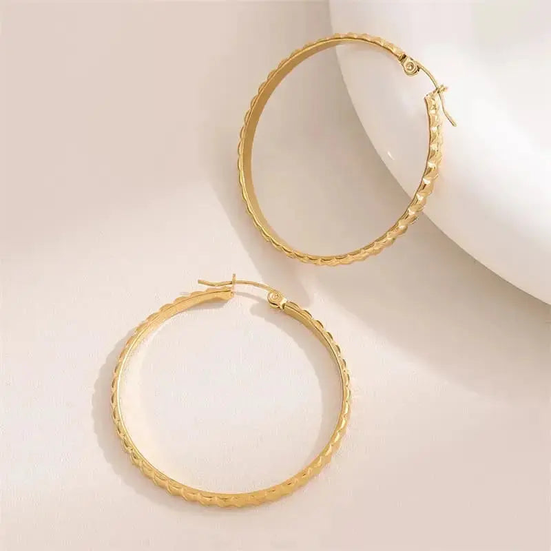 boucles creoles posées sur tranche AMILINE