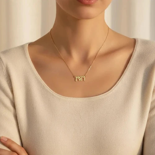 collier-1989-acier-dore