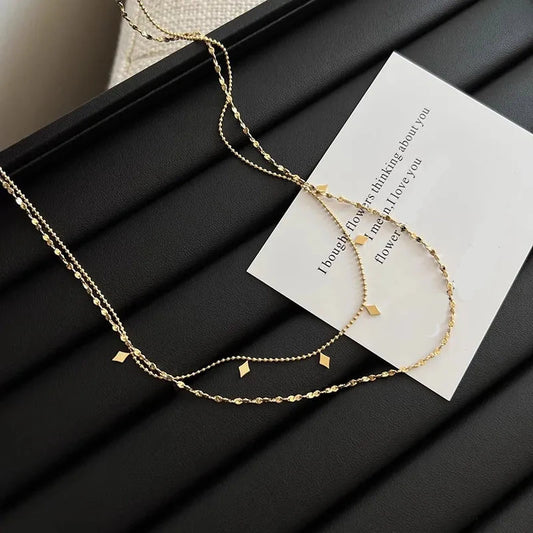 Collier femme double chaîne losanges doré