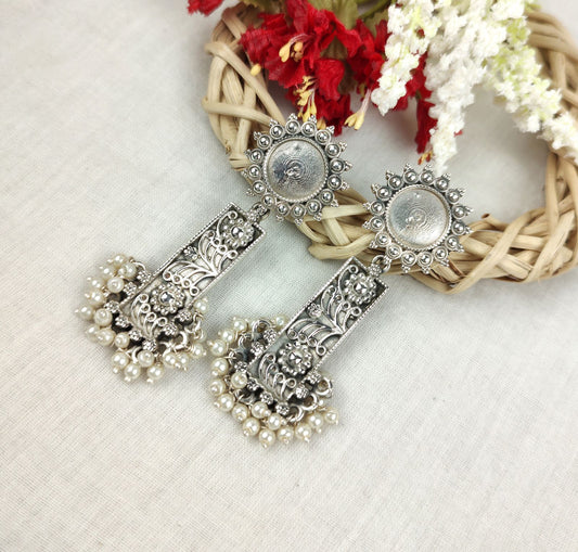 Boucles d'oreilles vintage en argent avec perles