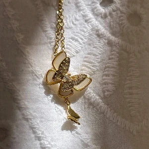 Collier doré et zircons