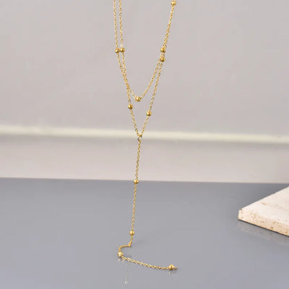 Collier Y acier inoxydable dore longueur ajustable femme