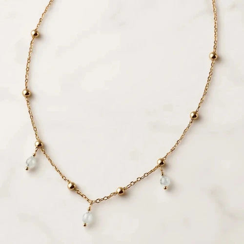 Collier femme acier inoxydable pompons legers