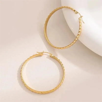 boucles creoles posées sur tranche AMILINE